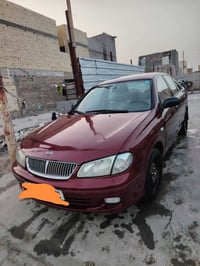 نيسان سني ٢٠٠٣ قبق اسود اتوماتيك سابقا لون اصفر تخم تاير جديد صدر امام...