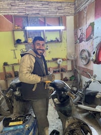 الديوانية • مصلح دراجات • مقابل جامع القائم