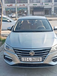 سياره للبيع MG 5 موديل 2024 سياره بيه رصعات باب خلف الصدر و يوجد منظوم...