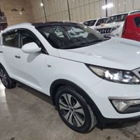 سبورتج ٢٠١٤ خليجي ماشيه ١٠٠ الف مكفوله من صبغ ولبارد سياره جديده  محرك...