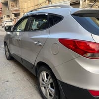 من رخصه الادمن سياره توسان موديل20014 مراوس بكورلا هايبرد او بيع  تاير...