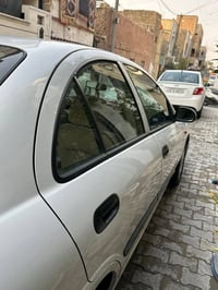 نيسان سني ياباني للبيع  2009 السعر 108للتواصل07730871599