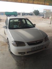 مازدا ٣٢٣ • موديل ٩٩ • تحويل مباشر