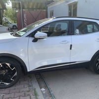 للبيع سبورتج 2025 ماشيه 21  كفاله عامه  رقم بغداد المواصفات بانوراما 1...