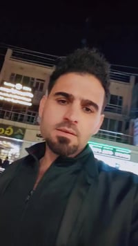 توزيع ملابس • كركوك • دار الشهيد