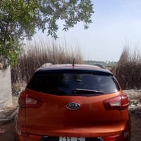 كيه سبورتج مصبوغه عام السياره 2014جاهزه من كلشي كير مكينه تبريد صدر تا...