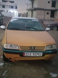 بيجو 405 موديل 2013 عارضه ب26بيه مجال لشراي 07727941847