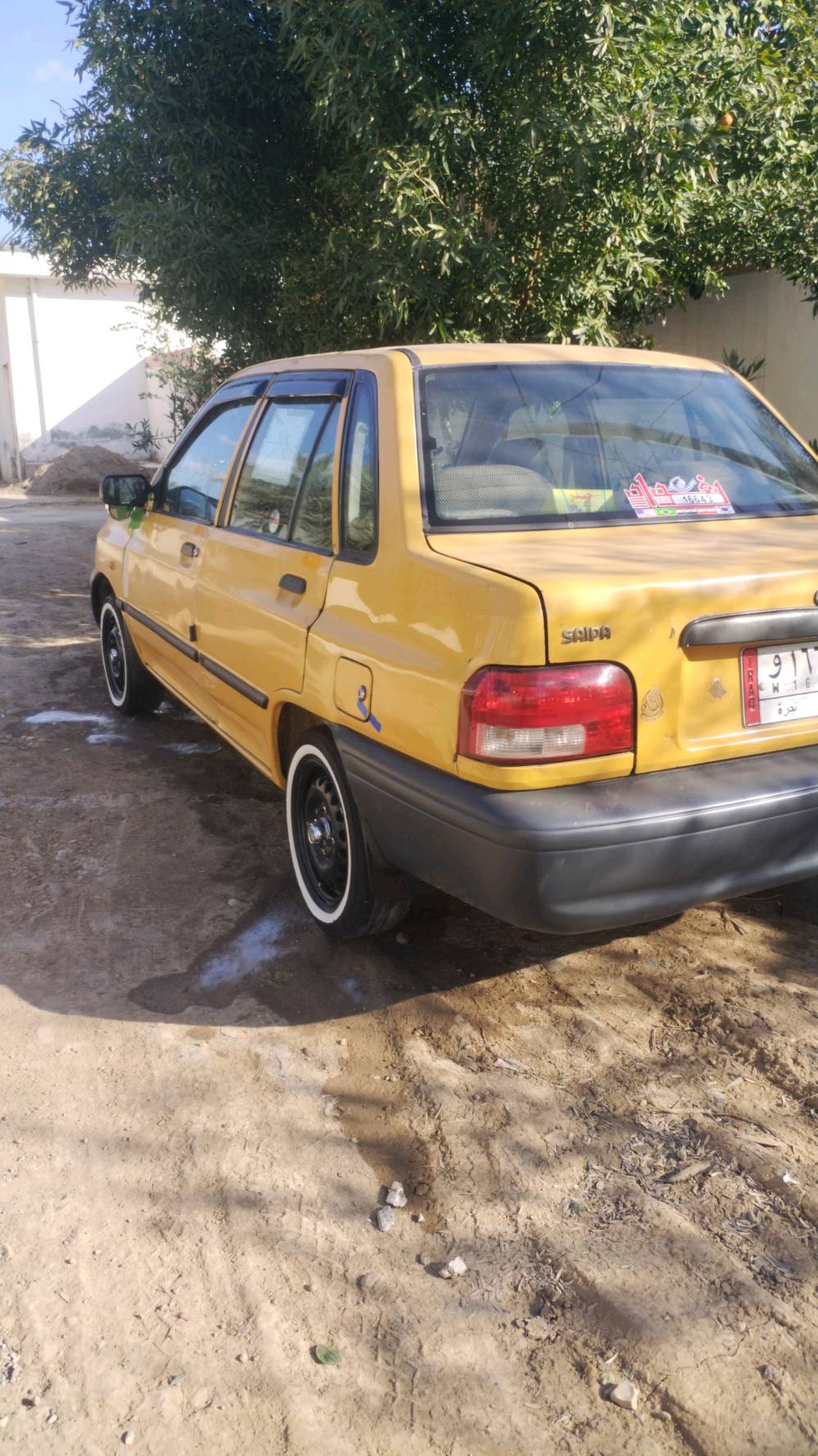 السياره موديل 2014 كير ومكينه وكلچ مكفول تبريد وتدفئة شغال هيئة وغرامة مصفرة موقع السياره بغداد الشعب 