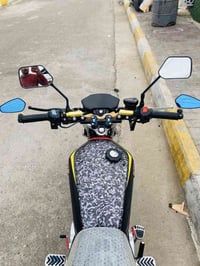 دراجة نارية من نوع سيفان (SVANIY) بمحرك سعة 200 سي سي (CG200). الموديل...