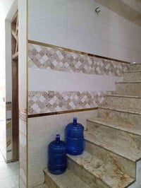 مساحة ١٠٠م • واجهة ٢٠م • شارع المصرف