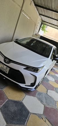 كورلا هايبرد 2024 فول مواصفات فتحه بصمه علامة الزركة hev  بيها بارد بس...