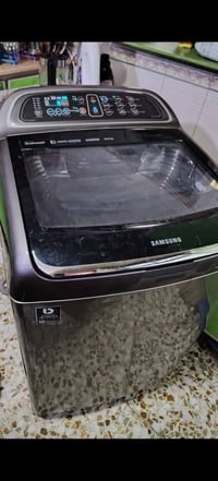 غسالة مستعملة للبيع نوع سامسونك  نظيفة وشغالة  حجم ١٨ كيلو السعر ٣٠٠ ا...