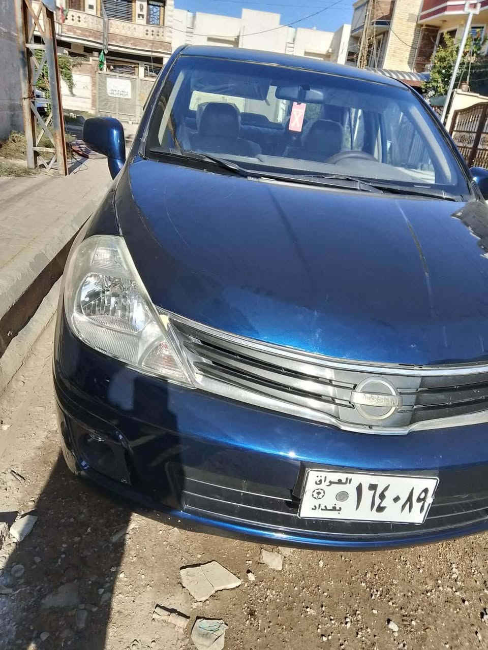 نيسان فيرسا موديل ٢٠٠٧ السياره جاهزه تبريد كير محرك جديده مكانها بغداد البياع سعرها ٦٥ هاتف *********** السياره مصبوغه حزام
