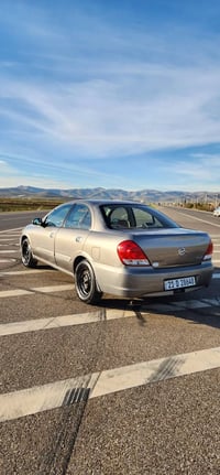 بۆ فرۆشتن نیسان سەنی یابانی  مۆدێل:2010 گێڕ ئۆتۆماتیک  گێڕ و مەکینە و ...