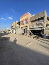 بناية تجارية • حي البساتين • وجهين