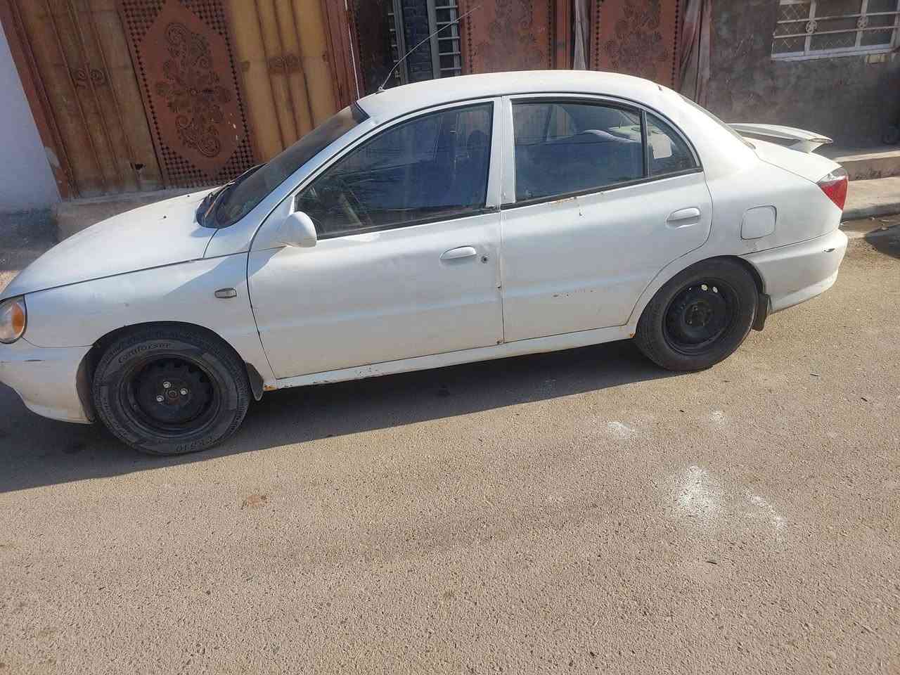 كيا ريو موديل  ٢٠٠٠ كول شغاله تبريد تدفى خير من الله رقم بغداد مشروع وطني متواجده بنجف سعر ٣٠ بيه مجال  *********** شرط تحويل
