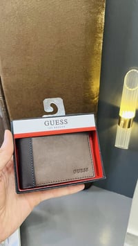 محفظة جلد طبيعي This is a Guess Men's Brown Leather Walle للاستفسار وا...