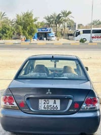 اخوان لانسـر 2010 السياره جديده كلشش كير محرك مكينه تبريد صدر تخم تاير...