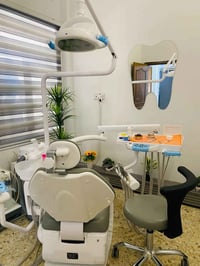 عيادةlighteeth لدكتور اسامة احمد الحسني لزراعة وتقويم وتجميل الاسنان ت...