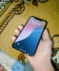 ايفون اگس ماكس • بطارية ٥٢٪ • ديوانية