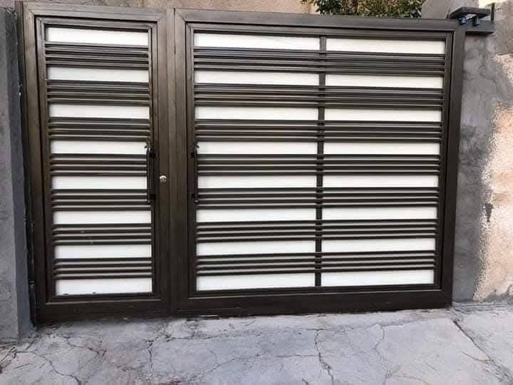 حدادة أبو جود لبيع كافه أنواع الابواب والشبابيك والمحجلات والقمريات العنوان موصل  صناعه الكرامه جانب الايسر انسب الاسعار واتساب ***********
