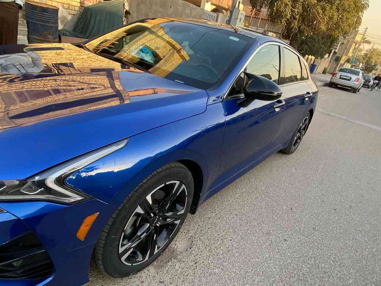 Kia K5 2022 GT-LINE 
كي فايف k5 2022
موصفات GT line 
فول الفول على الاخير  موصفات 
 1_بانوراما 
2بصمه 
3سايد بريك بصمه
5مثبت سرعه
6نضام ABS
7مانع انزلاق
8حساس  اطارات 
9بك لايت لد
10شاشه كبيره لمس
11كامره دواره
12كشافات اماميه 
13شاشه عطال 
14ويل كروم 
15ردار جانبيه 
16مراقبه نقطه العمياء 
17ردار الخطوط البيضاء  ردار امامي وخلفي وجوانب السياره 
18شاير  با المري 
19كشنات جلد اسود
20مقعد ساق كهرباء 
22نضام قياده خمس وضعيات 
23بلوتوث +usb+auX
24فول تحكم ستيرن 
25كير اوتو +عادي 
26نوتو بريك 
27الخريطه 📍
 28 زنود + ليد 
29نوتو هولد
30التشغيل عن بعد  
‏AOTO HULD 31
32تصميم خارجي رياضي 
33نضام المحلاحه
34مصابيح الخلفيه LED
35مصابيح ضباب LED
36محرك تيربو 1600
37السيارة رقم بغداد الجديد بسمي 
تشغيل عن بعد اطفاء عن بعد 
قيادة ذاتيه اربع قيادات بيها 
حادثها مثل مموضح بل صورة فقط دعاميه وبنيد بسيط وبالعراق صار بيها هلال الجاملغ الخلفي مصبوغ ومن امريكا التكمه العكس السايق كلير ونص الباب الخلف السائق صبغ

 
 يتوفر لدينا شحن الى الامارات وتركيا   
خدمة التخليص الكمركي والنقل الى جميع محافظات العراق من جميع منافذ العراق الحدودية  

للتواصل *********** بغداد 
*********** دهوك
*********** دهوك
00905348133355 تركيا 
العنوان : بغداد / البلديات / قرب جسر 7 نيسان  
دهوك / شارع بهار ستي / داخل المعارض / معرض رشيد سعيد 
#مزاد_هايدرا
