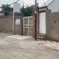 حي الحسن العسكري • ٢٤٠م • مقابل باب الخلفي