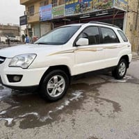 عندي كيا سبورتاج 2009  وارد خليجي فول مواصفات واحد على واحد  سياره جدي...