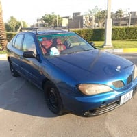 نيسان بريميرا 2001 محرك 2000 كير اوتو  تبريد شغال  صدر خلفي امامي جديد...