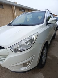 توسان 13 خليجي رقم بغداد ابسمي ماشيه 136              كير و المحرك  من...