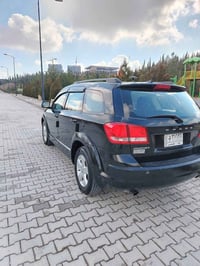 دوج جورني ٢٠١١ محرك ٣٦٠٠ لون اسود رقم بغداد بسمي ٧ راكب ٣ قطع تبريد مح...