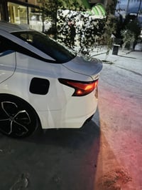 نيسان التيما • اس ار • ١١٠٠٠