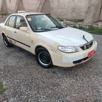 مازدا 323 • ٢٠٠١ • تاكسي