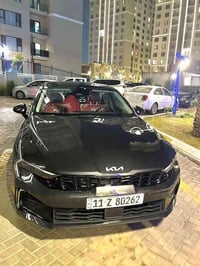 07715443587  كي 5 موديل ٢٠٢٥  وارد أمريكي ماشيه  ٩٠٠٠ كيلووو السياره ز...