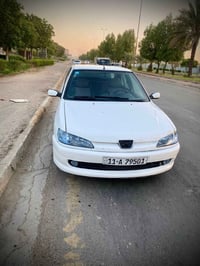 بيجو فرنسي 306 رقم بغداد انكليزي باسمي سنويه لل30  جهازه من كلشي كير م...
