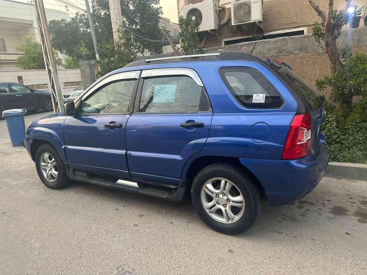 كية سبورتج 2008 رقم بغداد بسمي تحويل ثاني يوم هزه لوحات كله جديد سياره مكبنه كير كفاله بيها صبغ اقل الاحزام بدون داخل خليجي مكينه 2000 دوش  بيع سريع السعر 83 وبيها مجال مكان السياره بغداد حي الجهاد ***********
