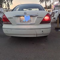 نيسان صني2008 ياباني ابيض رقم انبار الماني باسمي مصبوغة حزام شغالة الك...