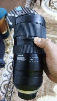 عدسة ٧٠.٢٠٠ تايمرون للبيع السعر خاص تجي تاخذهز من باب بيتنه رقمي ٠٧٧٣٠...