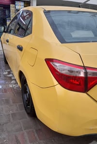 للبيع كورولا تكسي بغداد بأسمي موديل ٢٠١٩ حادث جاملغ وبنيد ناشر رقم الش...