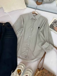 قميص • النجف • ملابس