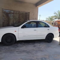 نيسان صني • صني 2006 • سيارة صني • نيسان 2006 • صني للبيع • رقم بغداد