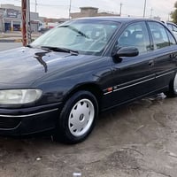 اوميغا • ٩٥ • رقم انكليزي