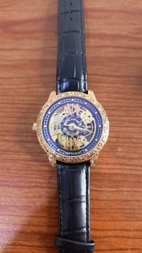 ساعة أوتوماتيك • توصيل