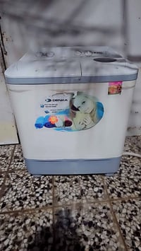 غسالة ملابس • دنكا • شغالة