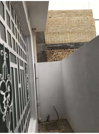 الديوانية حي الجامعة • ١٠٠م • سخان وماطور