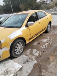 سياره ميسوبيشي كلنت 2008للبيع السياره طلعنه بيها بل مطر وما اشتغلت ابي...
