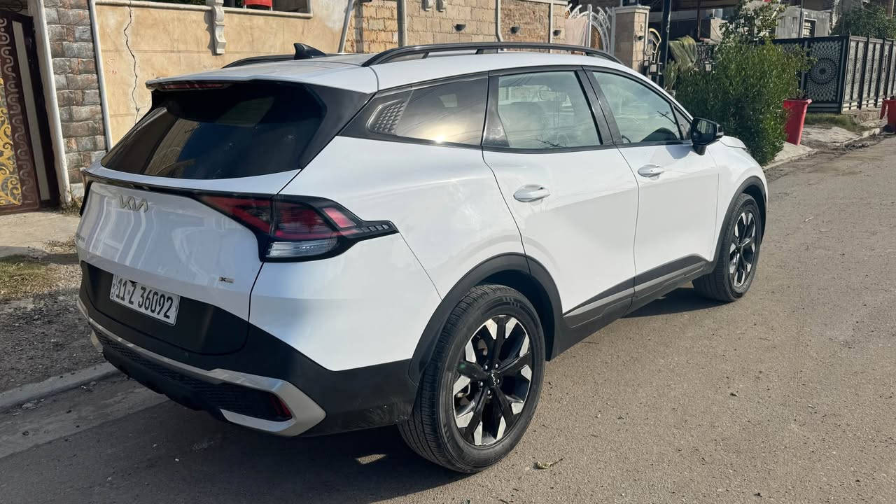 ‏2023 Kia Sportage X Line
 كيا سبورتج إكس لأين دخول

موديل 2023  ‌‎
 (4) سلندر محرك 2500       
فول  موصفات    
عداد المسافه  82 الف 
مواصفاتها :
.بصمة  
 شاشة كبيره لمس
كاميرا دوارة 
رادارات  /رادار جانبي /رادار خلفي
 حساسات خلفي 
خرائط 
 كشنات تدفة‏ 
 كشنات جلد .
 دفع رباعي فور ويل
نزول منحدرات                                                    
كشنات كهرباء
.تبريد قطعتين 
.اوتوهولد .  
ويل كروم 
مسجل ناطق
بلوتوث USB ابل كار بلاي والاندروير . 
 حاجب ليد
.نقطه عمياء
.اشاراة بالمراياة الجانبيه                                     
. فول تحكم ستيرن                                             
. كير أوتو + عادي.                                              
-اوتو بريك.                                                         
. بريك بصمة.                                                      
‏Led .+  زينون
.شحن اللاسلكي                                                            
. ‏داخل اسود جلد 
. نضام قياده اربعة
. مثبت سرعه
. تحديد مسار 
. دمامات صوت  
.لايت بلادي Led +  زينون ‏دبل زينون اصلى . 
. رادار الخطوط البيضاء 
‏.شاشة إلكترونية
 تشغيل عن بعد 
‏-AUTO HOLD
‏Auto start 
مكان السياره بغداد 
السعر  195
*********** بغداد, العراق

