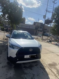 كورلا كروس 2025ماشيه6000مكفوله الاتصال عل الرقم ‭0773 039 5111‬