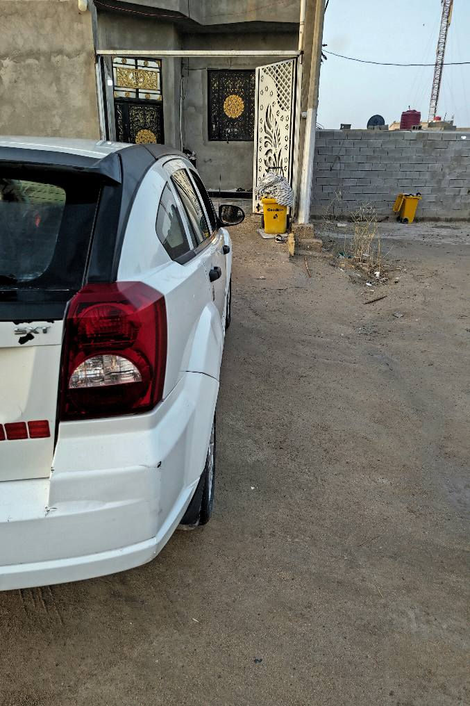 دوج كاليبر 2008 رقم بغداد مشروع وطني السياره بيهه كازكيد بس تمشي مكان السياره البصرة شط العرب رقم *********** واساب شط العرب, البصرة
