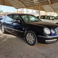 عندي كيا اوبرص 2006 محدثه 2009 محرك وكير افلون رقم بغداد انكليزي بيه ن...